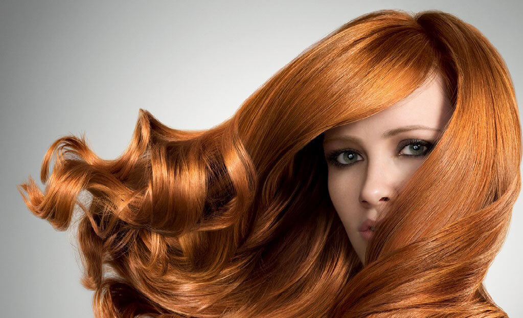 Copper red hair styled at the salon